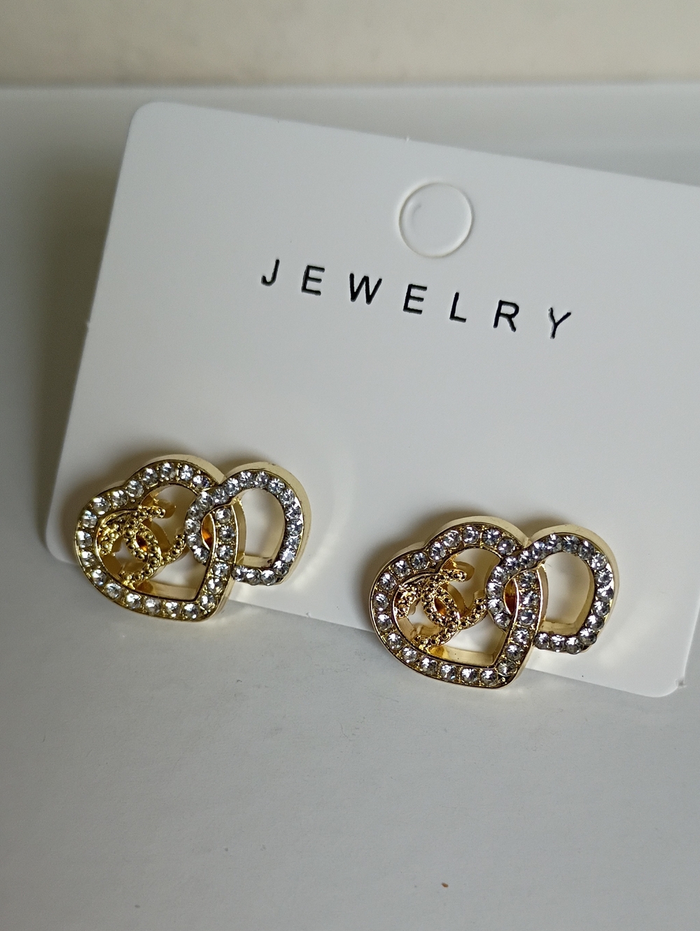 New Gold Tone Crystal Interlocking Heart Earrings -